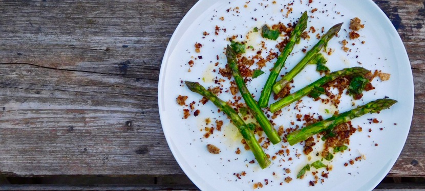 Asparagus with preserved lemons and anchovy crumb and with a zingy basil dressing